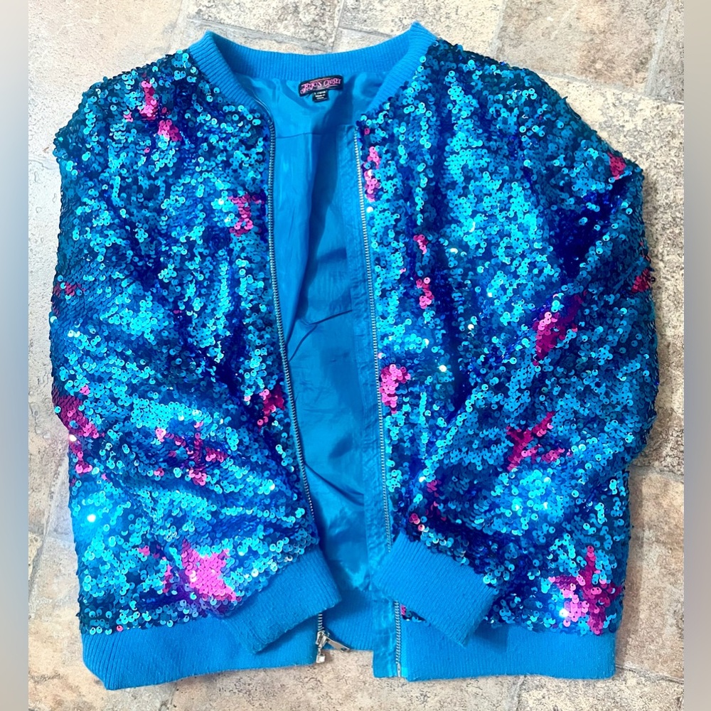 JoJo Siwa “Flip-Sequin Star-Print Bomber Jacket”
